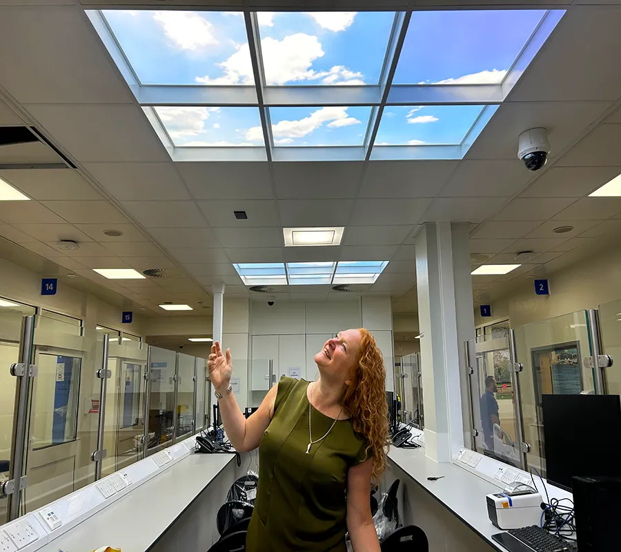 Gail Scott-Spicer, the Charity's CEO, standing in front of LED Skylights in ED Majors