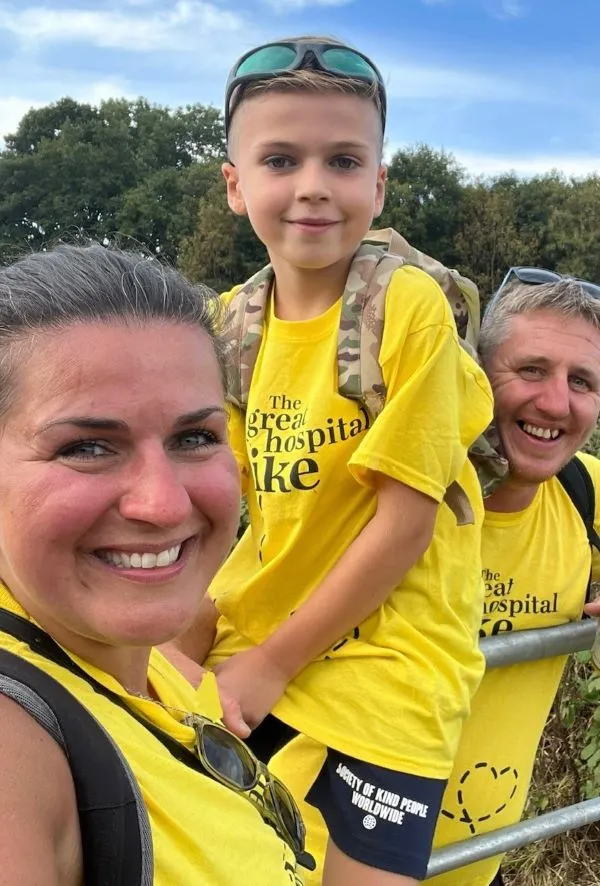 Debra at the Great Hospital Hike with her son and husband