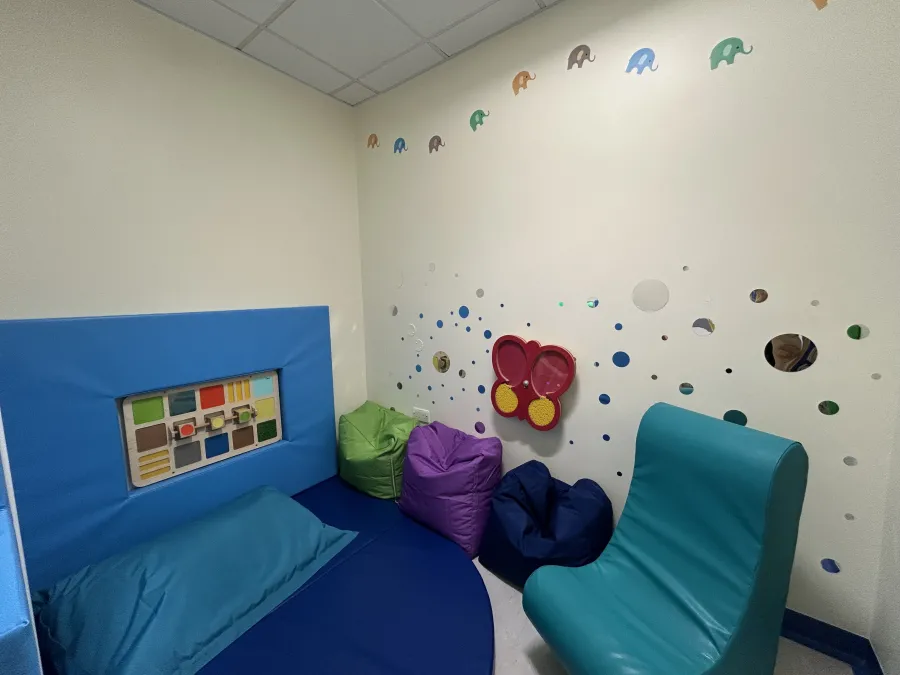 A picture of the new room with sensory toys to play with