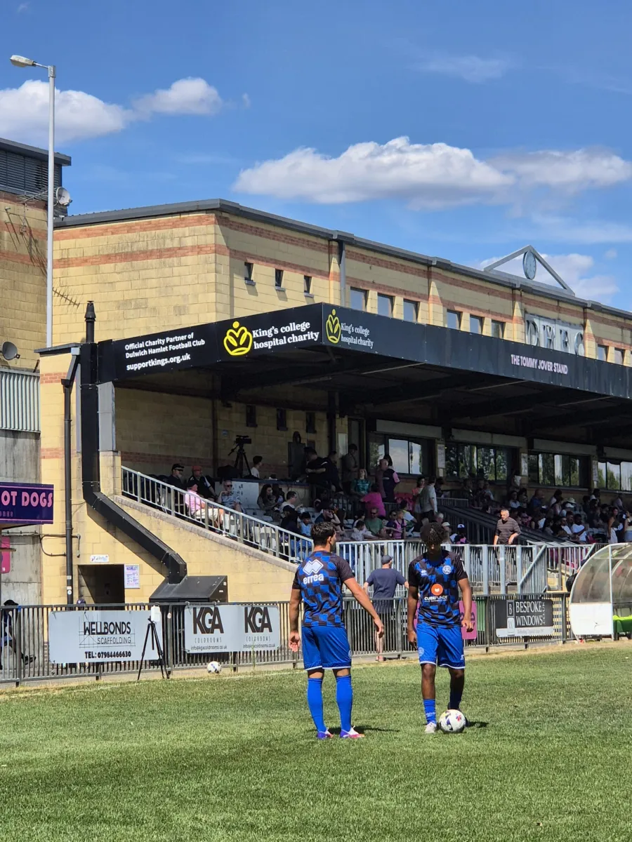 The King's College Hospital Charity logo on the main stand at Dulwich Hamlet Football Club