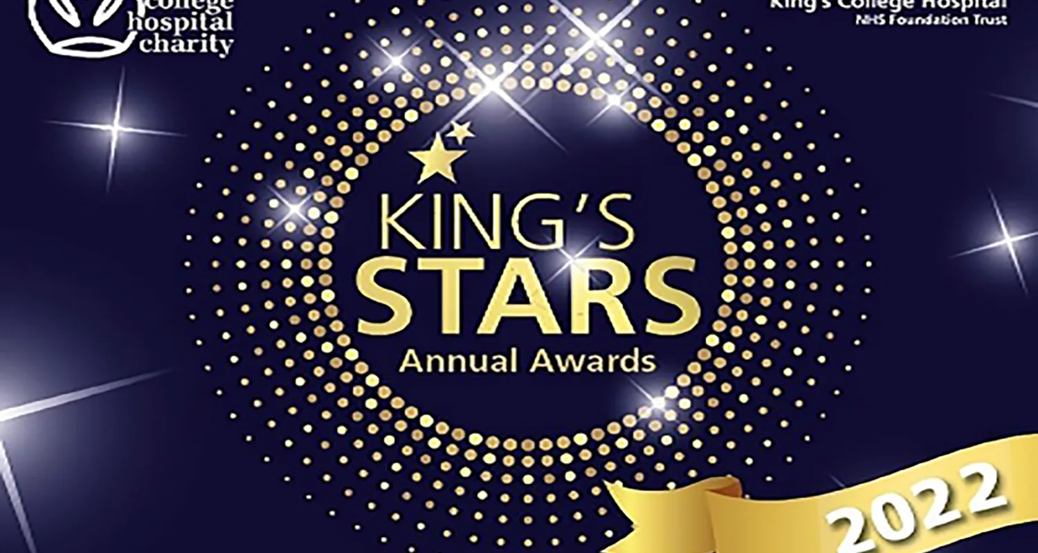 King's stars poster. It has a navy background with a gold logo in the middle, with the writing King's Stars.
