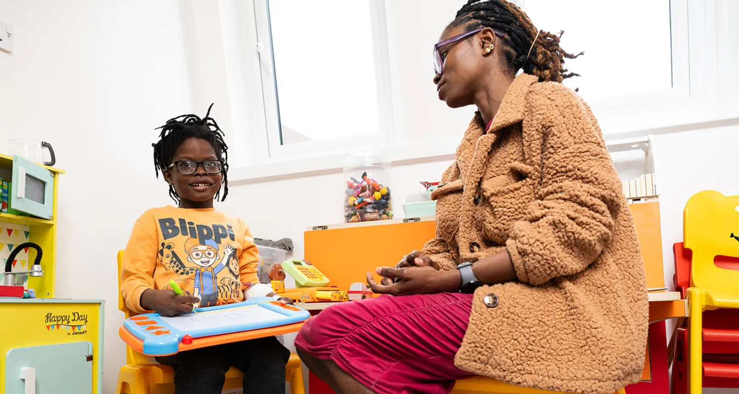 Image of mother and son enjoying a newly refurbished playroom 