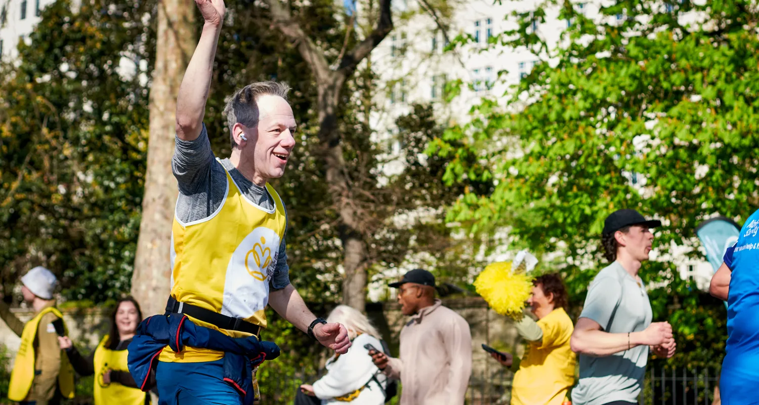 A runner in a King's vest