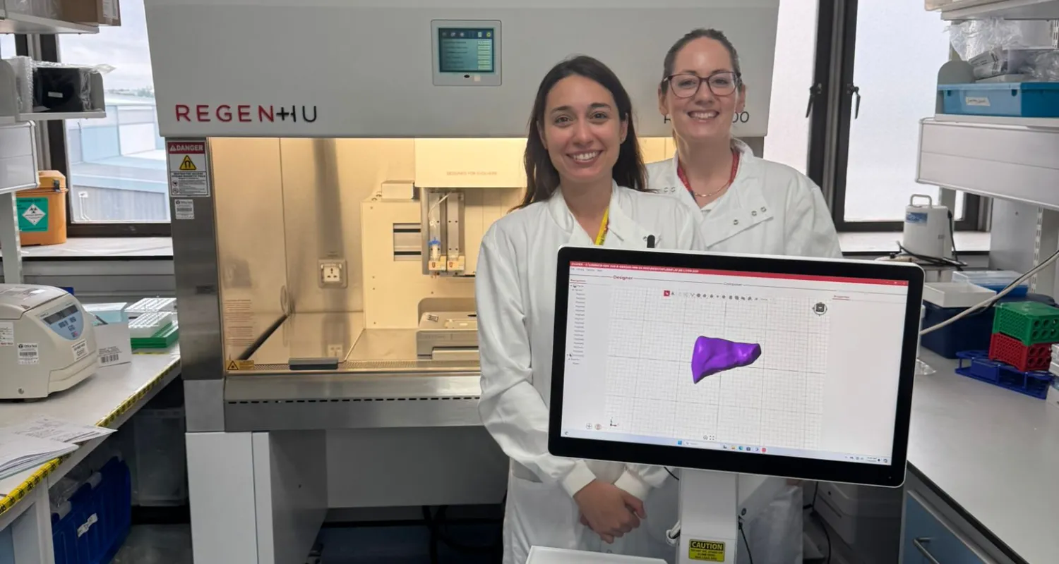 The liver research team with the bioprinter