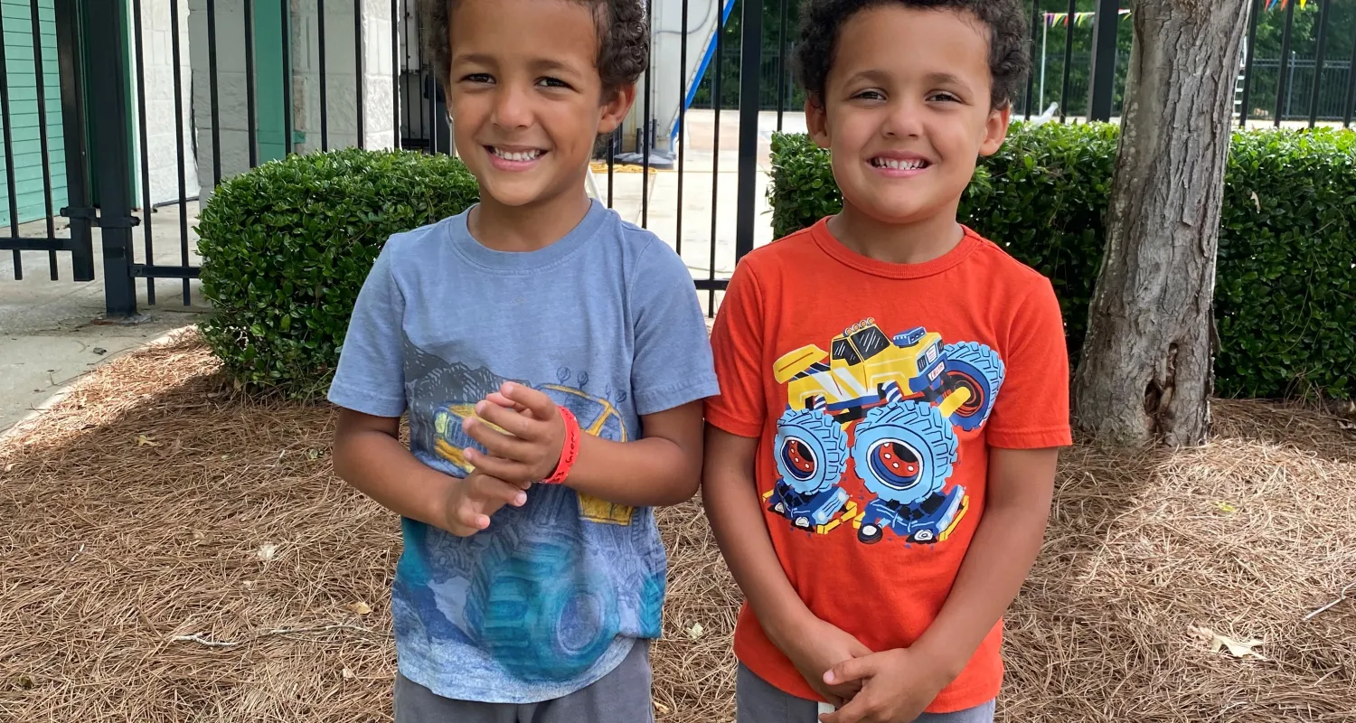 The Ogunmade twins pictured as grown up children