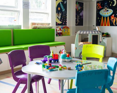 The playroom table covered in lego