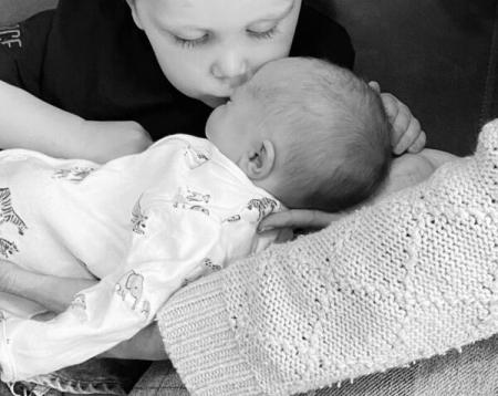 Evelyn sharing a special moment with her brother