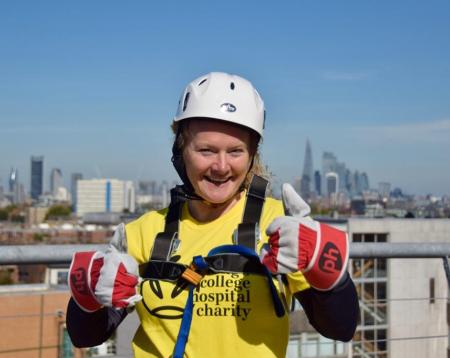 Gail with her thumbs up wearing a King's College Hospital Charity t-shirt wearing safety equipment