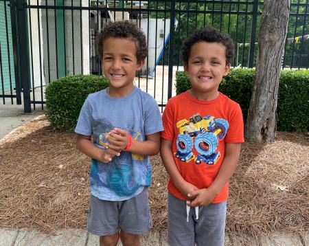 The Ogunmade twins pictured as grown up children