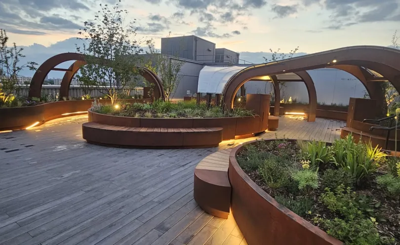 A new roof top garden for critically ill patients filled with green plants and flowers