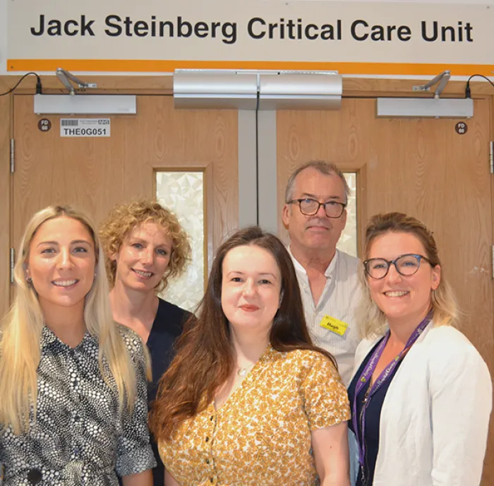 Picture of five members of King's psychosocial team standing outside the critcal care unit