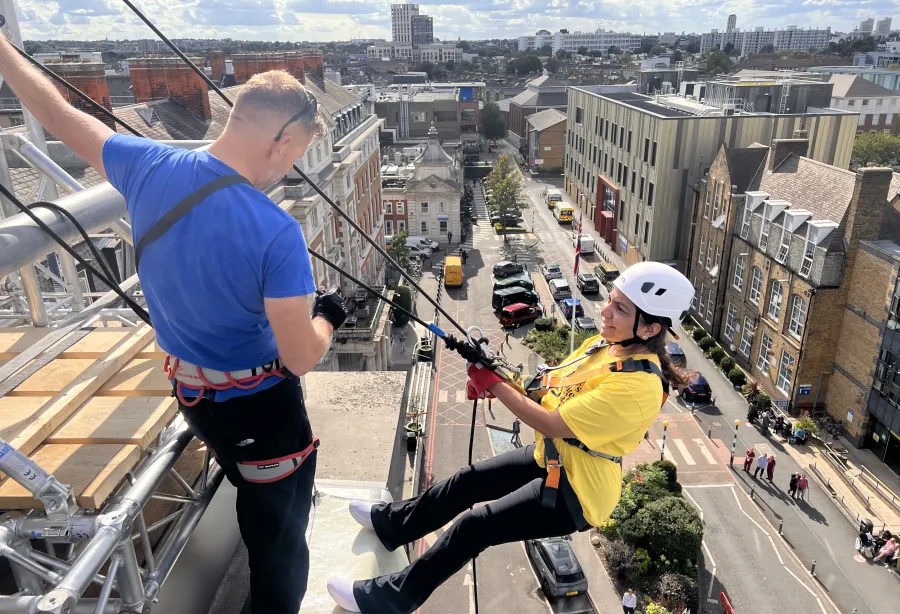 Participant taking part in the King's College Hospital Charity Abseil