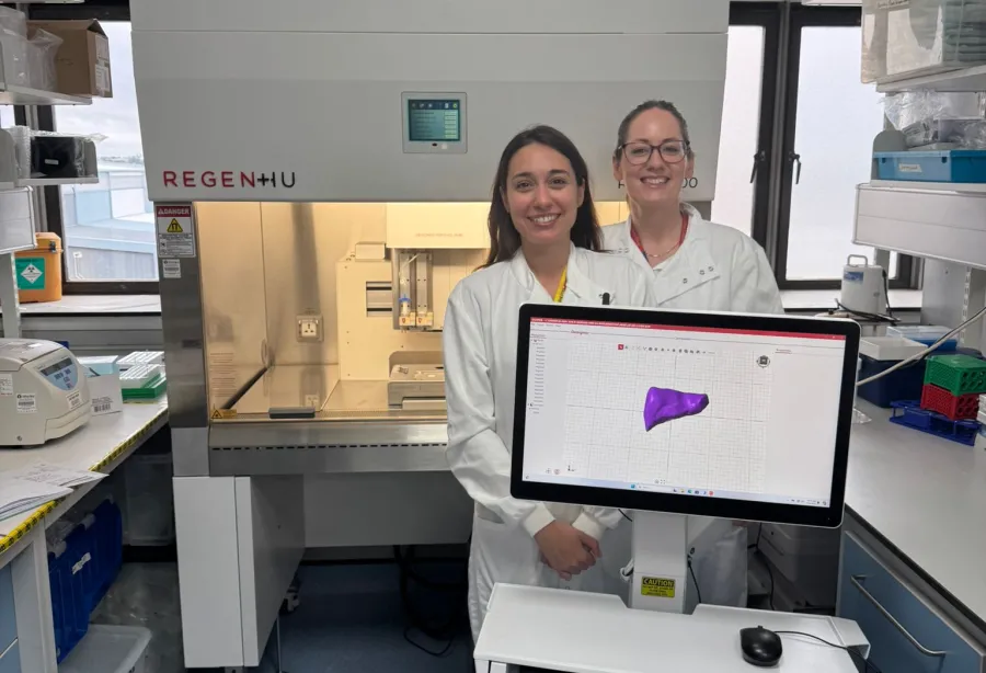 The liver research team with the bioprinter